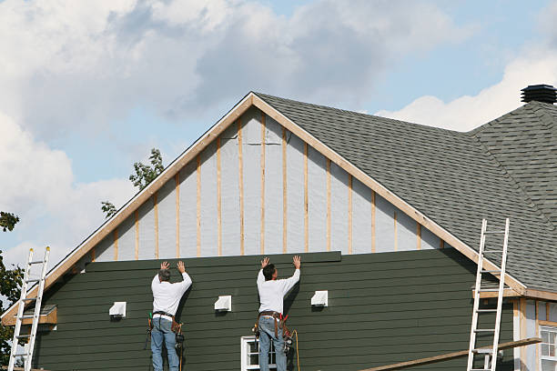 Professional Siding Replacement technician working in Smithton, PA